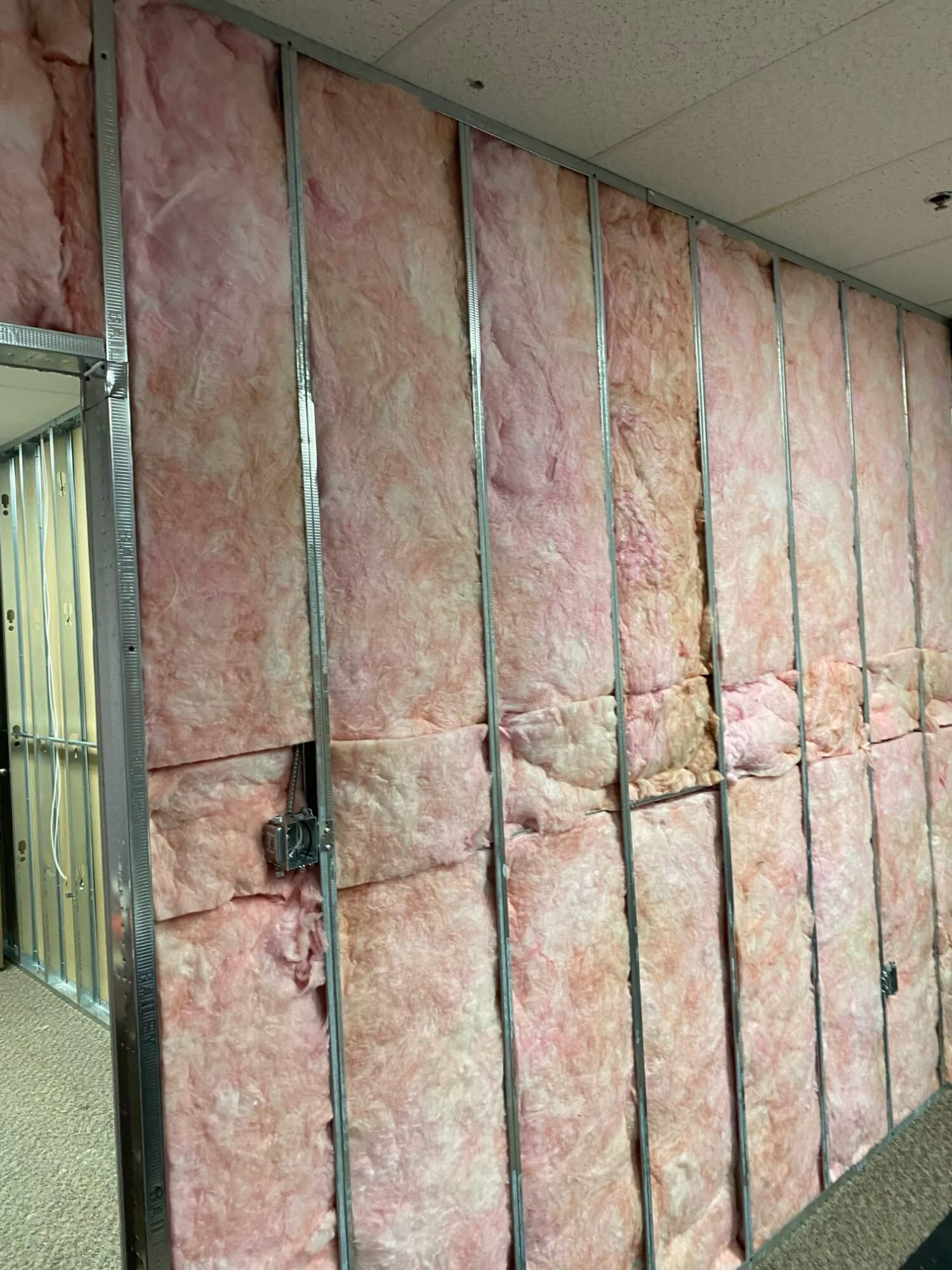 Fiberglass batt insulation in steel stud walls