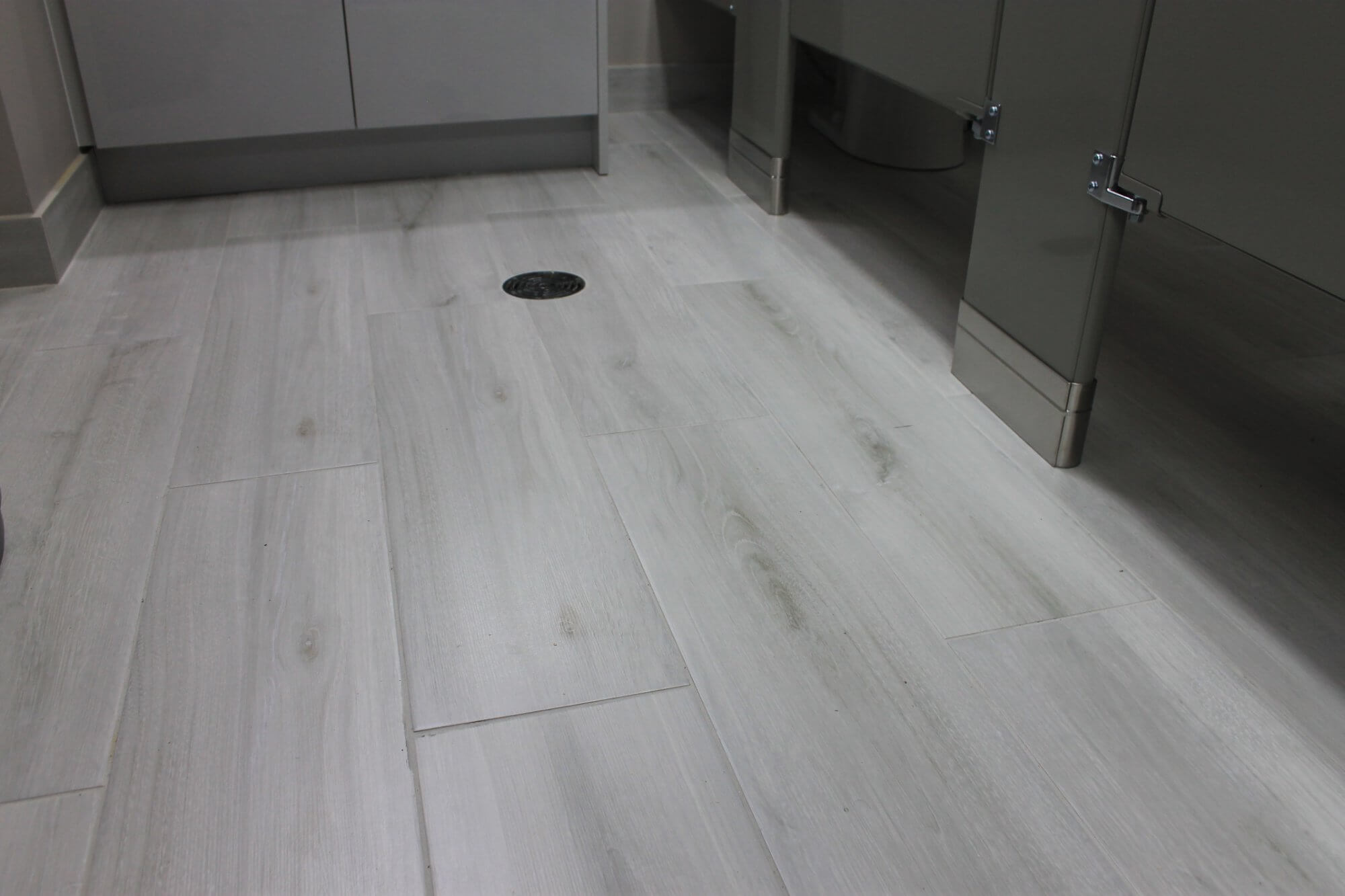 Washroom floor tile installation