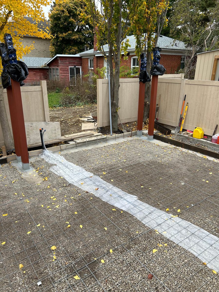 Concrete pad preparation with wire mesh